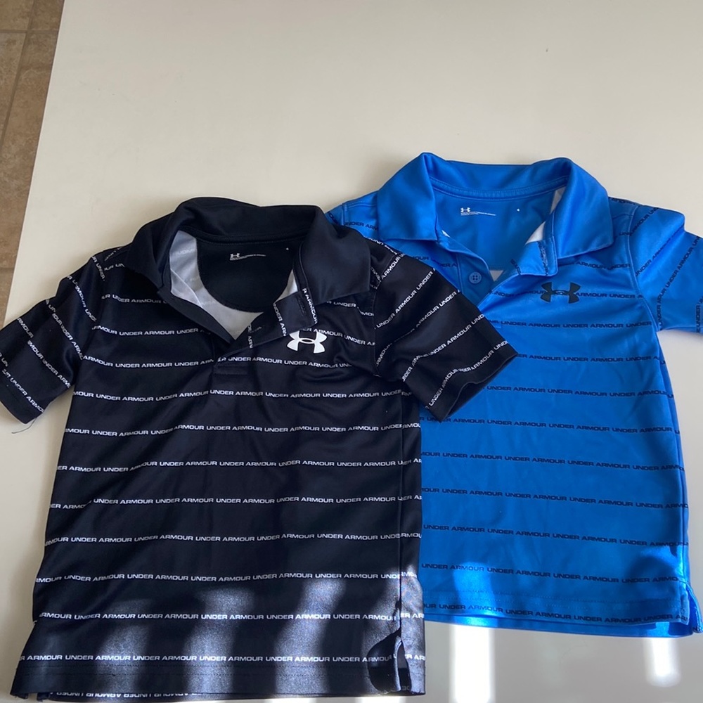 Under armor dry, fit, short sleeve polos 1 black and white, and 1 blue and black